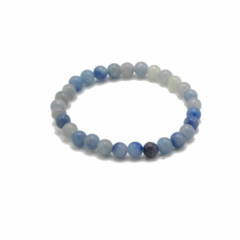Blue and pale blue bead bracelet on a white background