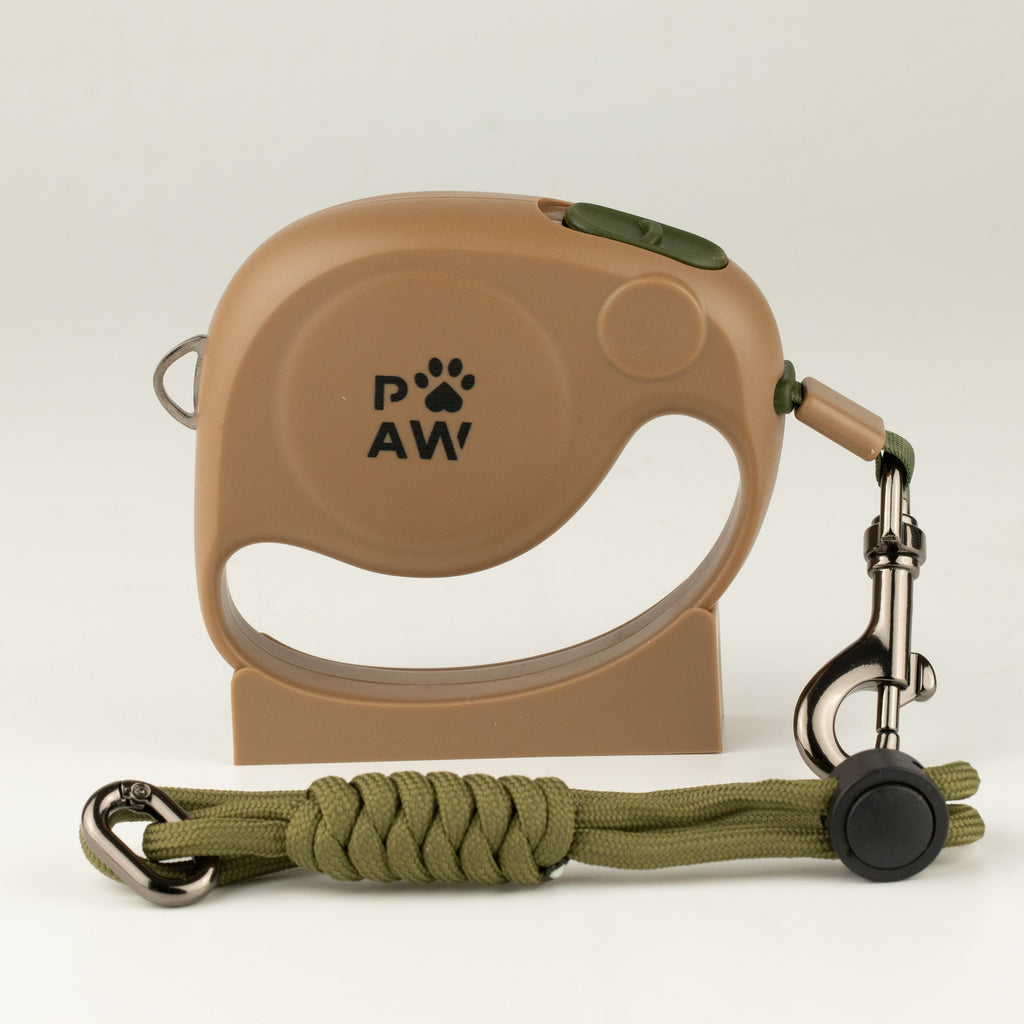 Brown retractable lead and rope wrist strap displayed together