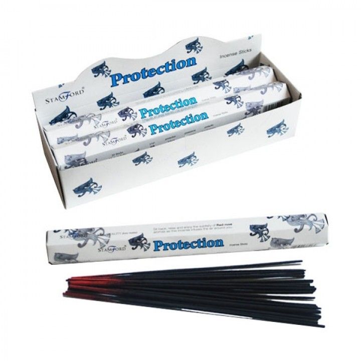 Protection Premium Incense in a white Stamford display box, with one wrapped stick and loose dark incense sticks