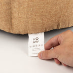 Care label attached to the underside of the pet bed