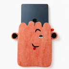 Laptop partly inside the pink felt pouch
