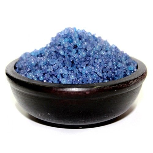 Hallway, Peaceful Home simmering granules, blue crystals piled in a dark bowl, shown from the front