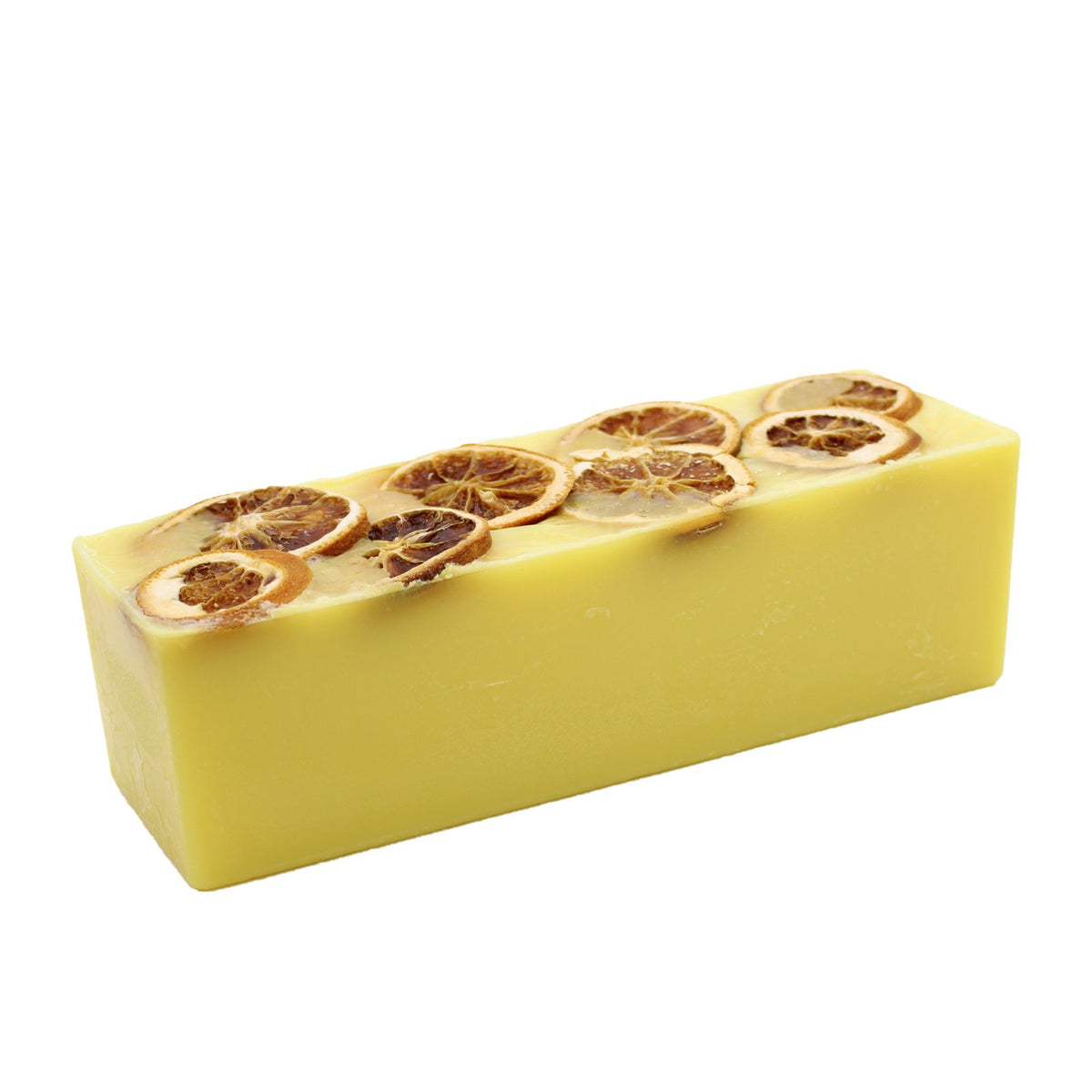 Slice of Sunshine, Soap Loaf, yellow rectangular loaf topped with dried citrus slices, shown at an angle