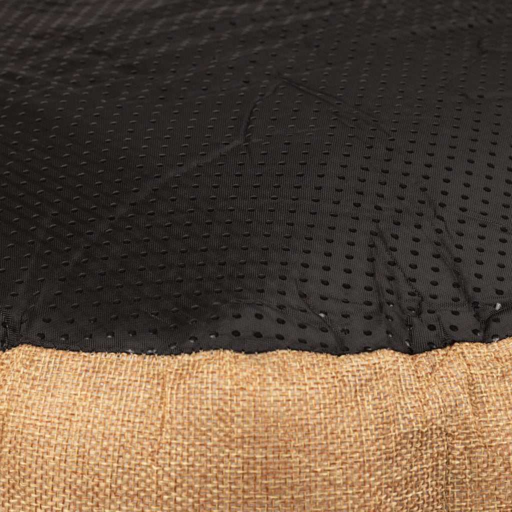 Close-up of the bed’s textured dark base