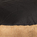 Close-up of the bed’s textured dark base