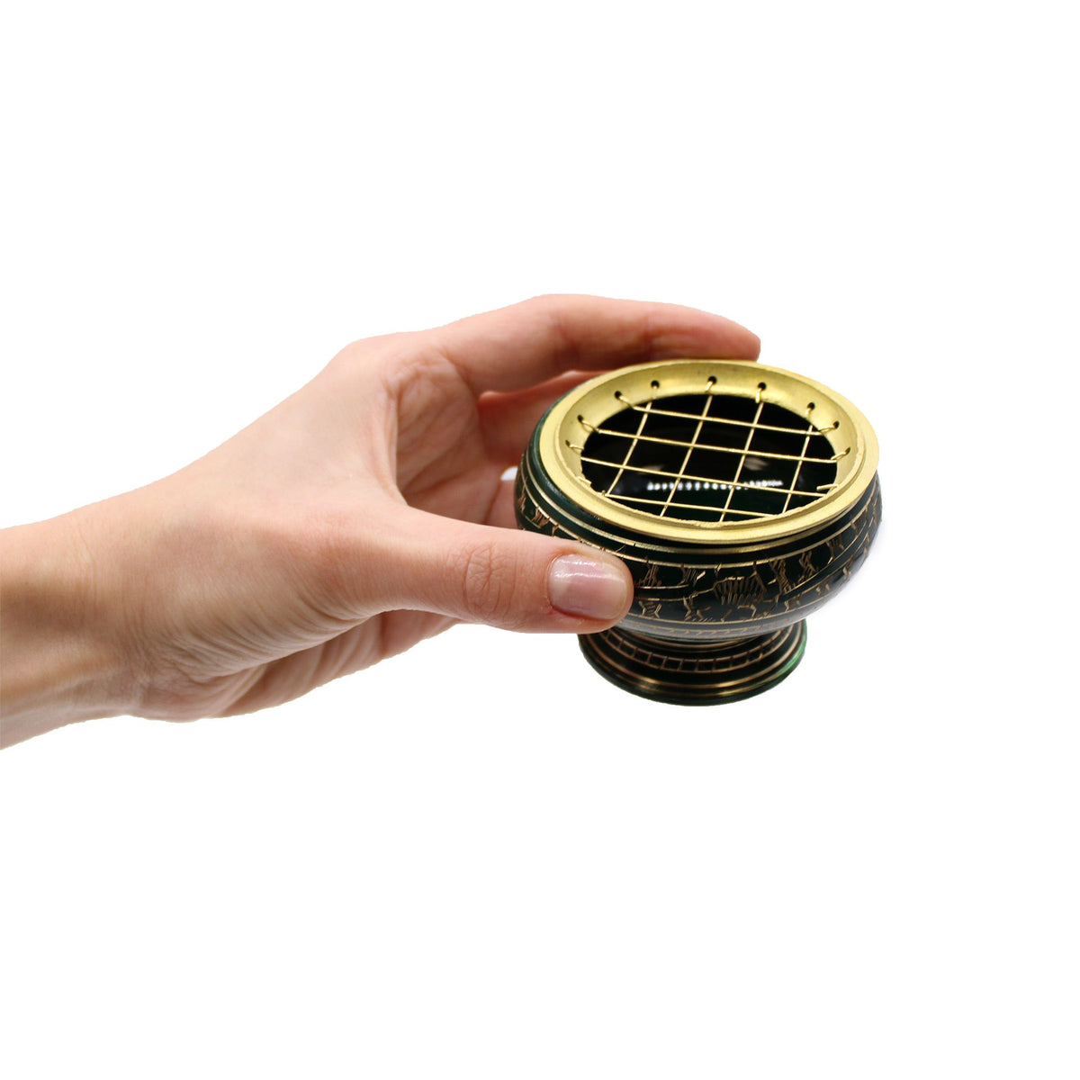 Chakra Tall Charcoal Incense Jar, Root, dark jar with a gold grid lid held in a hand