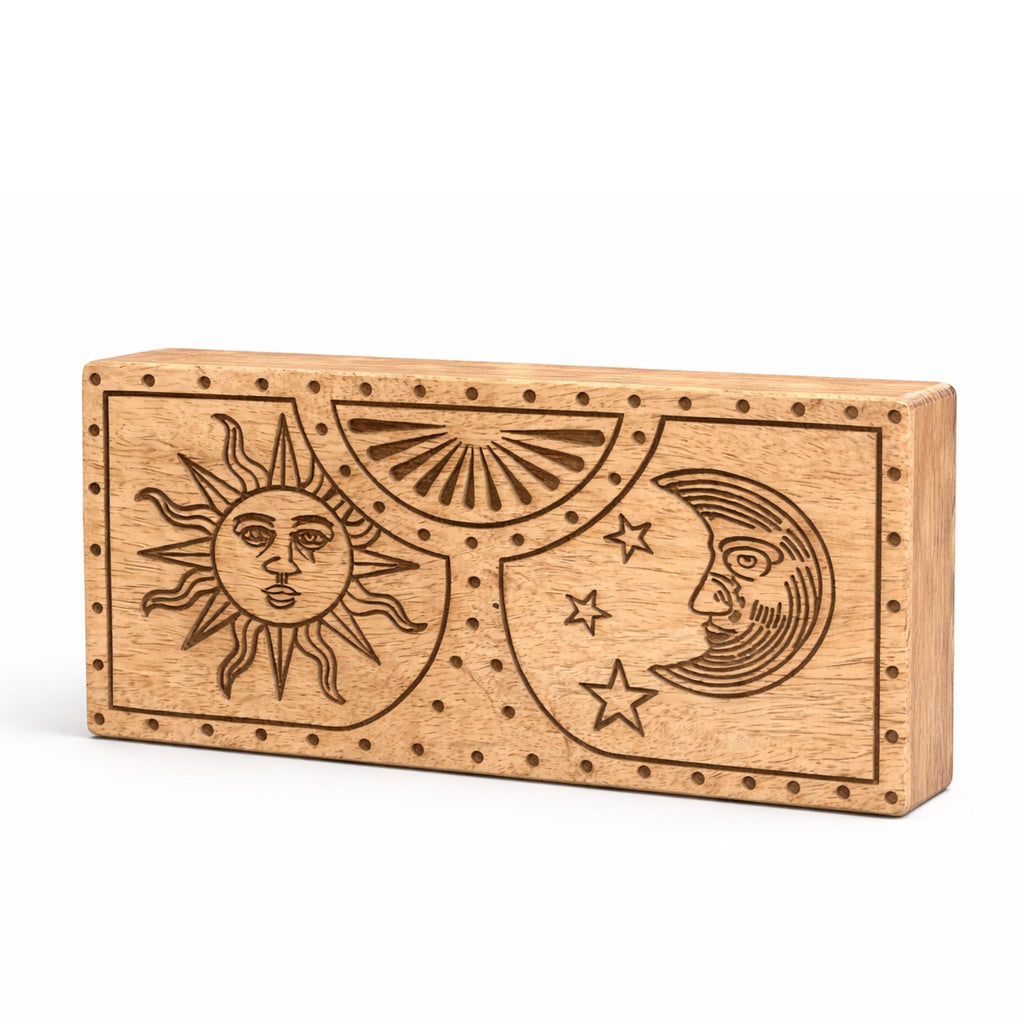 Sun, Moon Carved Crystal and Stone Box, closed light brown box with engraved sun and moon design, angled front view