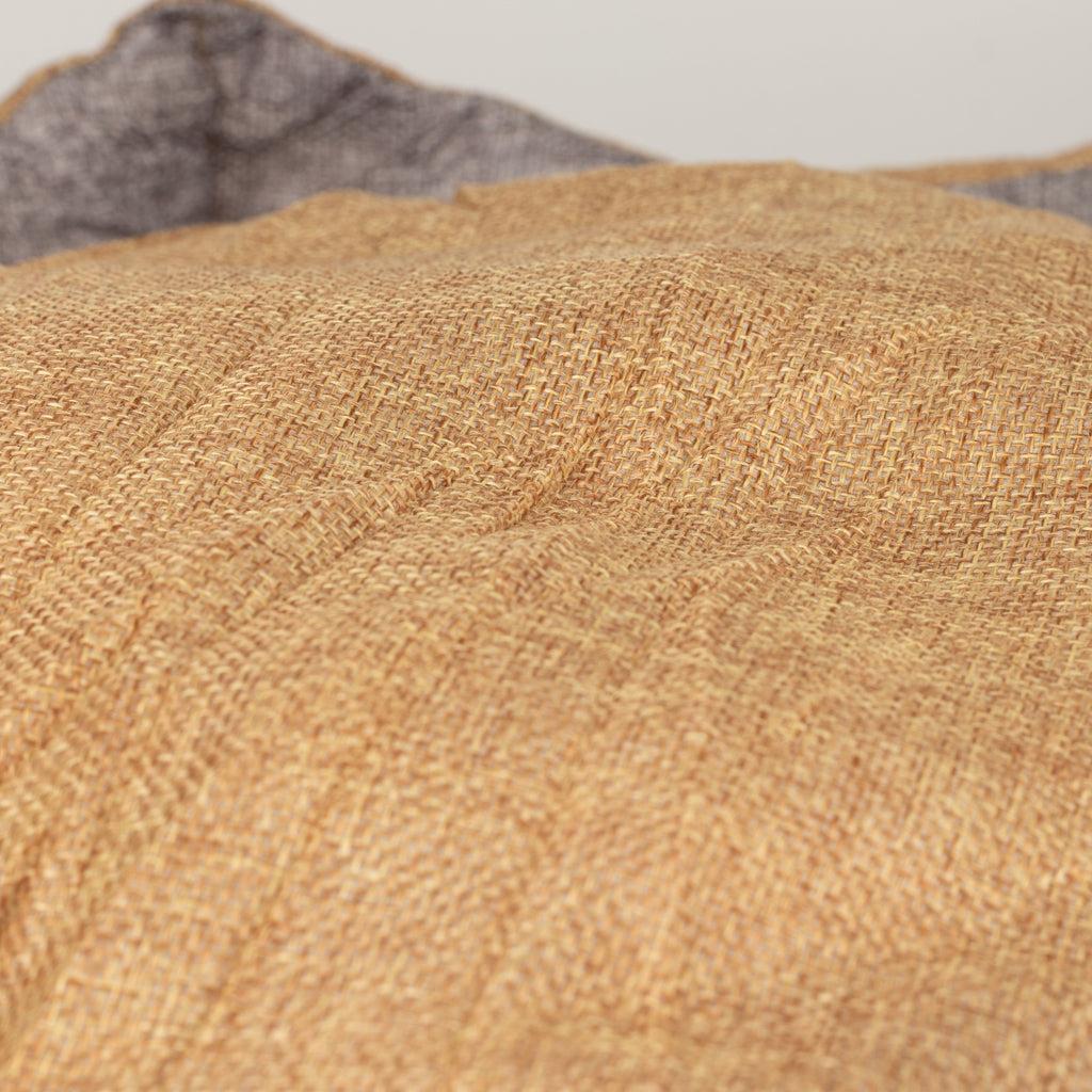 Close-up of the bed’s sand-coloured padded centre