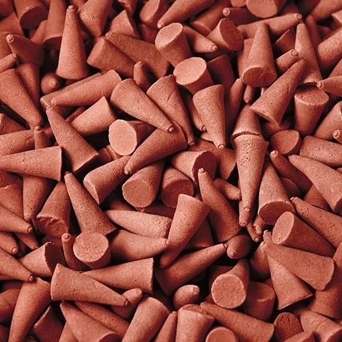 Bulk Incense Cones, Vertiver Gold, a close-up of many reddish brown cones piled together