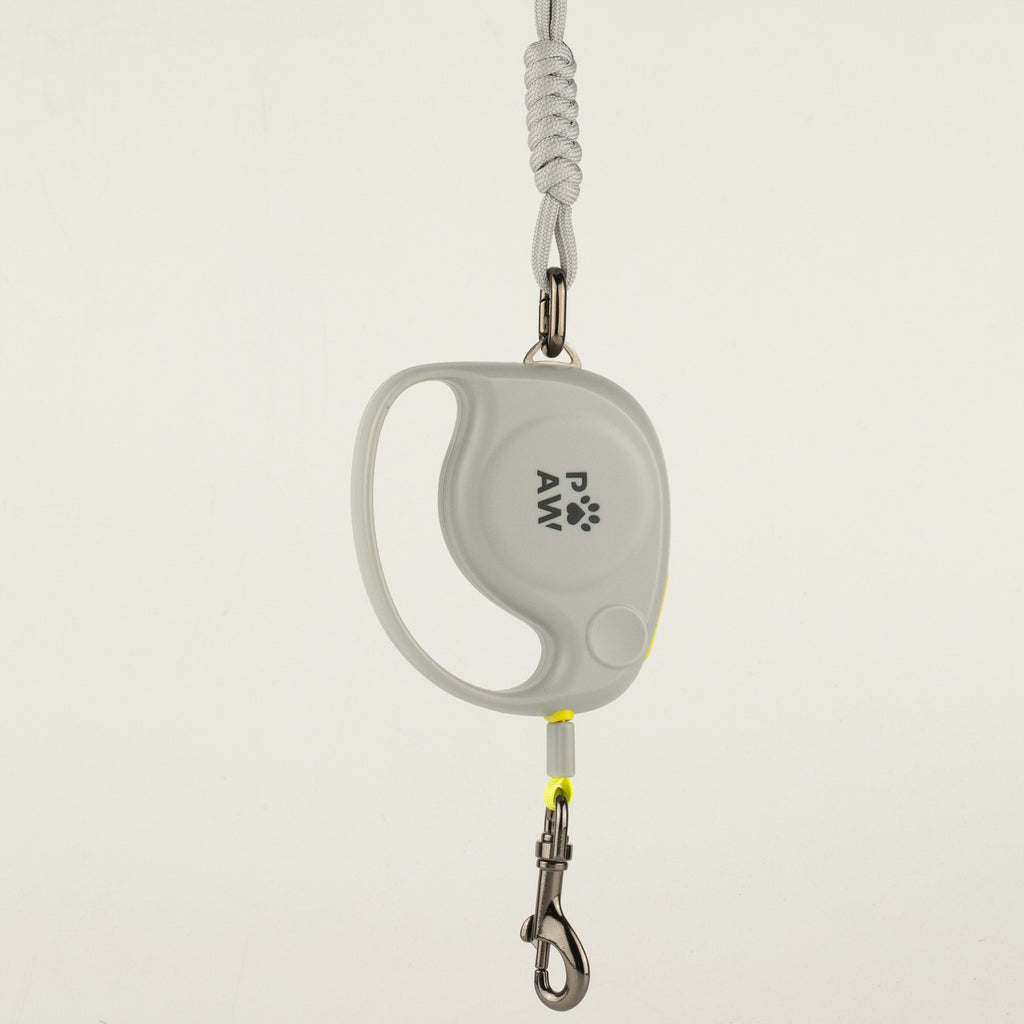 Paw grey retractable dog lead with yellow detailing and rope wrist strap