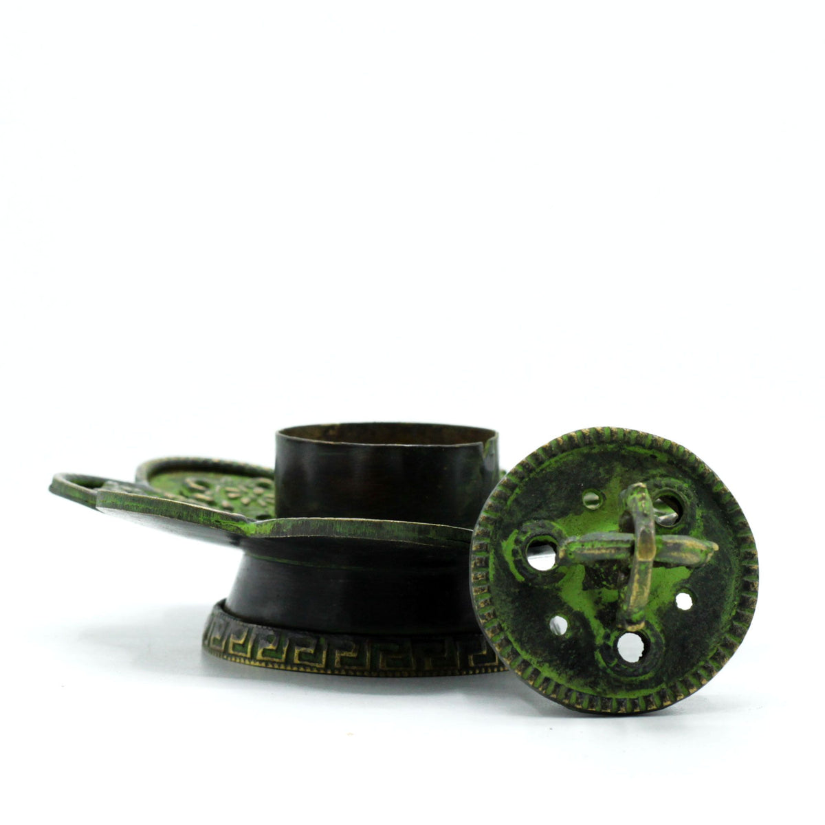 Brass verdigris incense holder shaped like a flower, with a pierced round lid