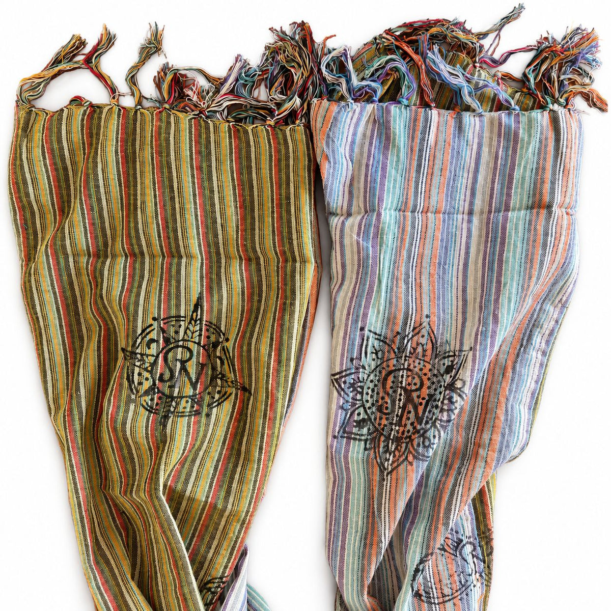 Travel Blessing Scarf laid flat to show both striped colour sections