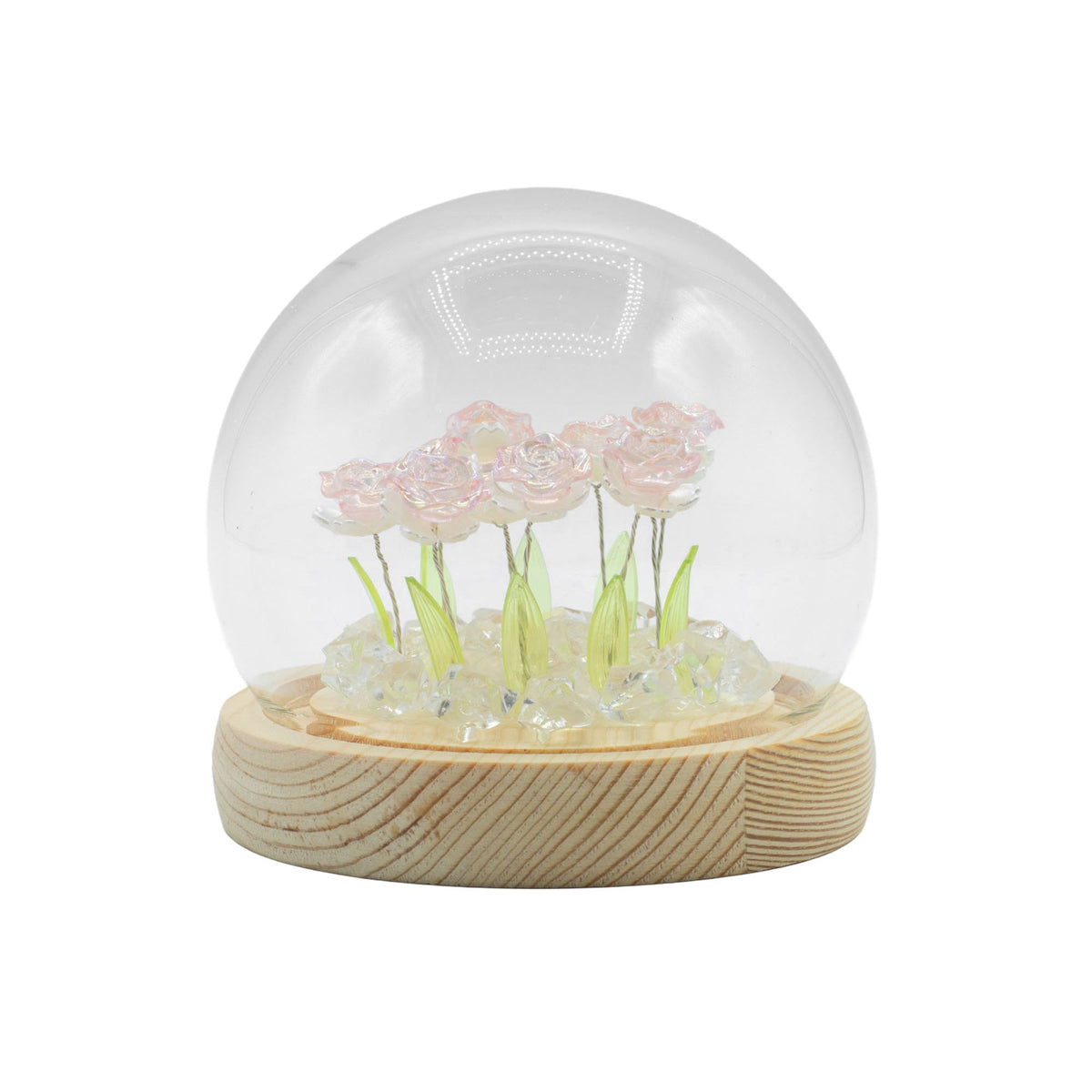 Floral Glow Garden Dome with pink roses beneath a clear glass dome on a pale wooden base