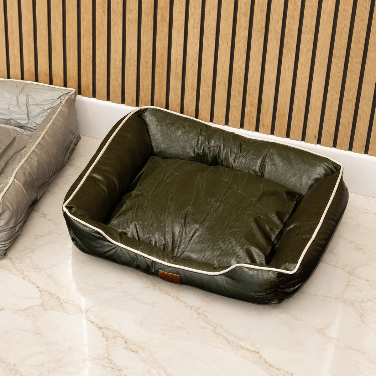 Khaki-green pet bed viewed from above