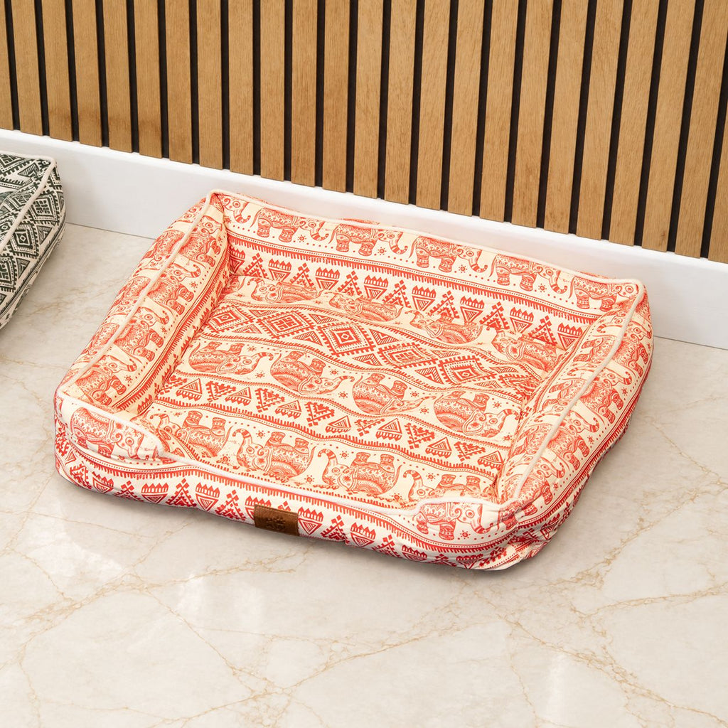 Red and cream bed viewed from above