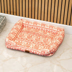 Red and cream bed viewed from above