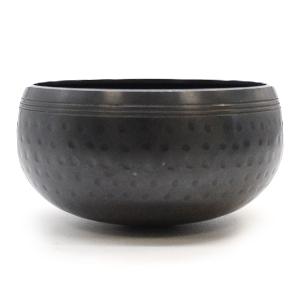 Black beaten bowl shown alone from the front, with a dimpled surface and open rim