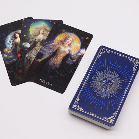 Tarot Cards with Guide Book, Goddess Arcana, illustrated cards fanned beside a blue deck showing a sun