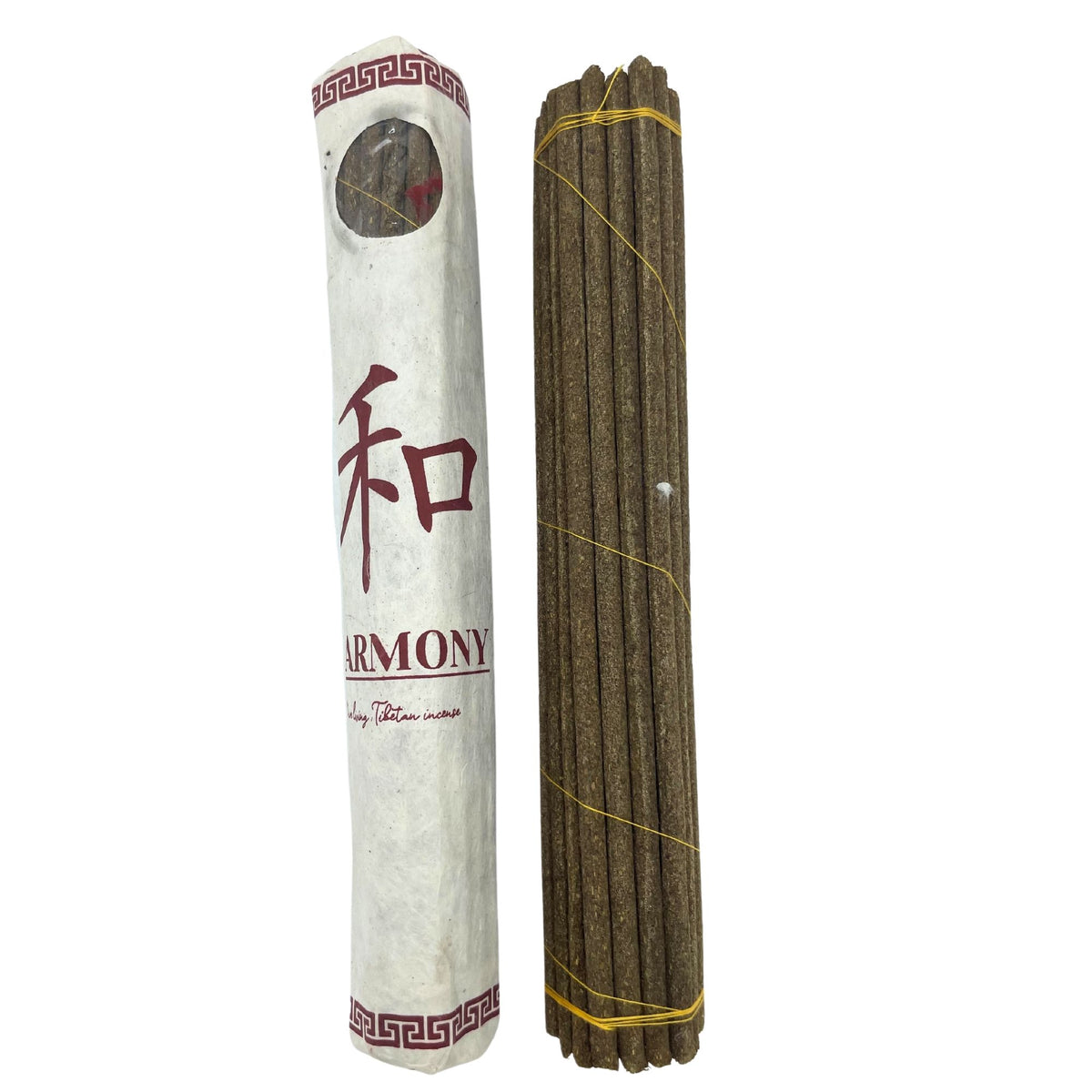 Rolled Pack of 30 Premium Tibetan Incense, Harmony, beside dark brown sticks tied with yellow string