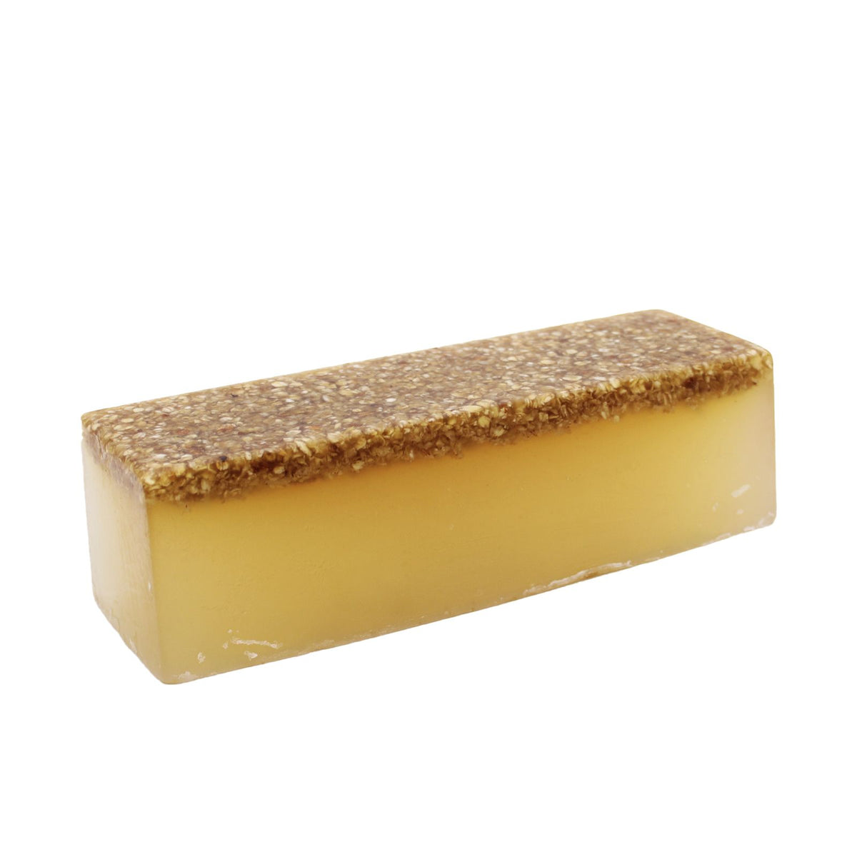 Honey & Oatmeal soap loaf, a single yellow rectangular bar with a grainy brown top on white