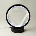 Gemstone halo lamp with aquamarine pieces around a selenite Water symbol