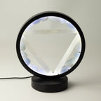 Gemstone halo lamp with aquamarine pieces around a selenite Water symbol