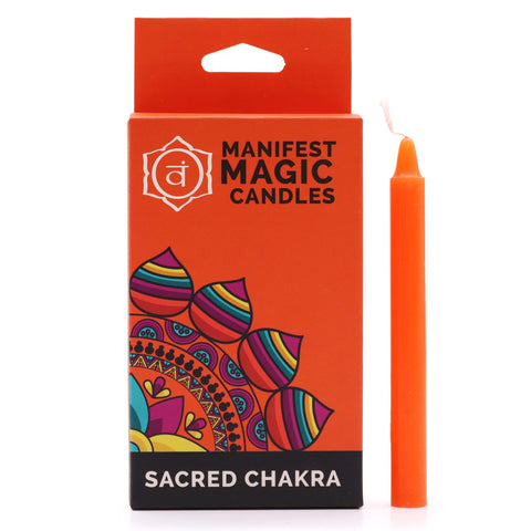 Orange candle beside its box, showing the label