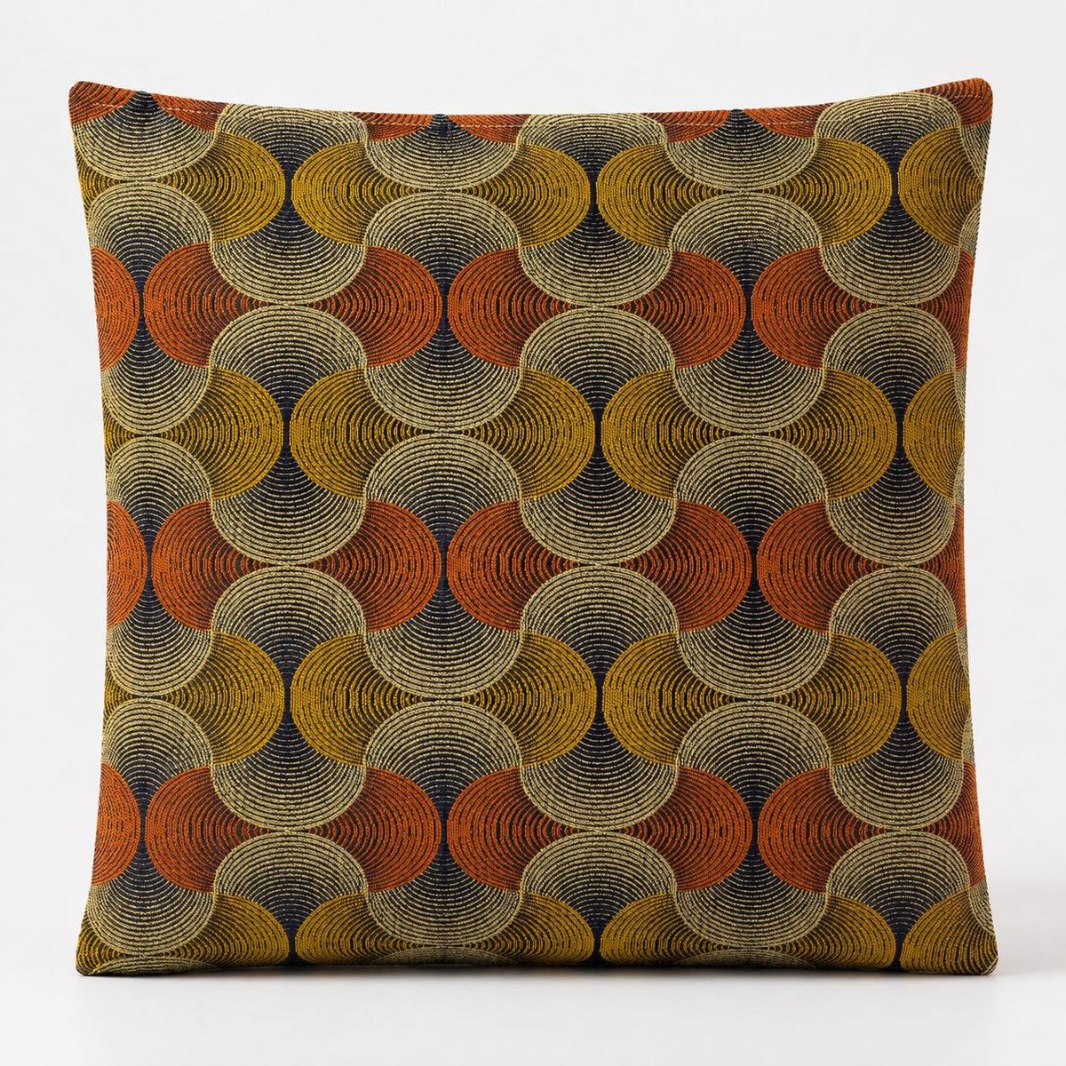 Urban Swirl cushion cover shown from the front, with a full mustard, orange and dark blue circle pattern