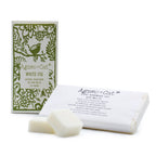 Agnes + Cat White Fig wax melts, a printed box with a wrapped bar and two loose soy melts.