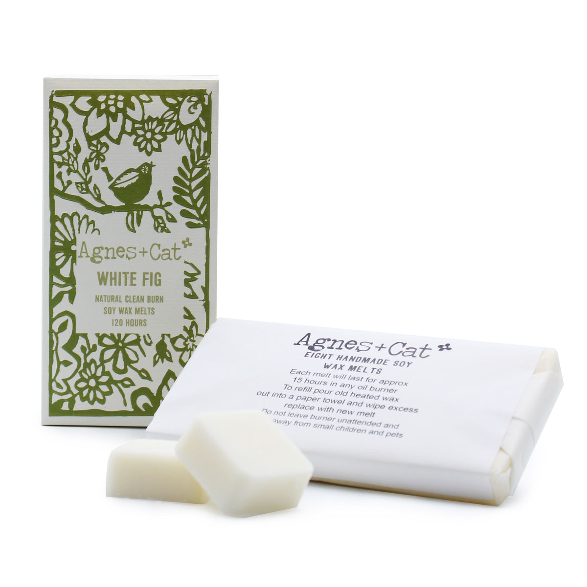 Agnes + Cat White Fig wax melts, a printed box with a wrapped bar and two loose soy melts.