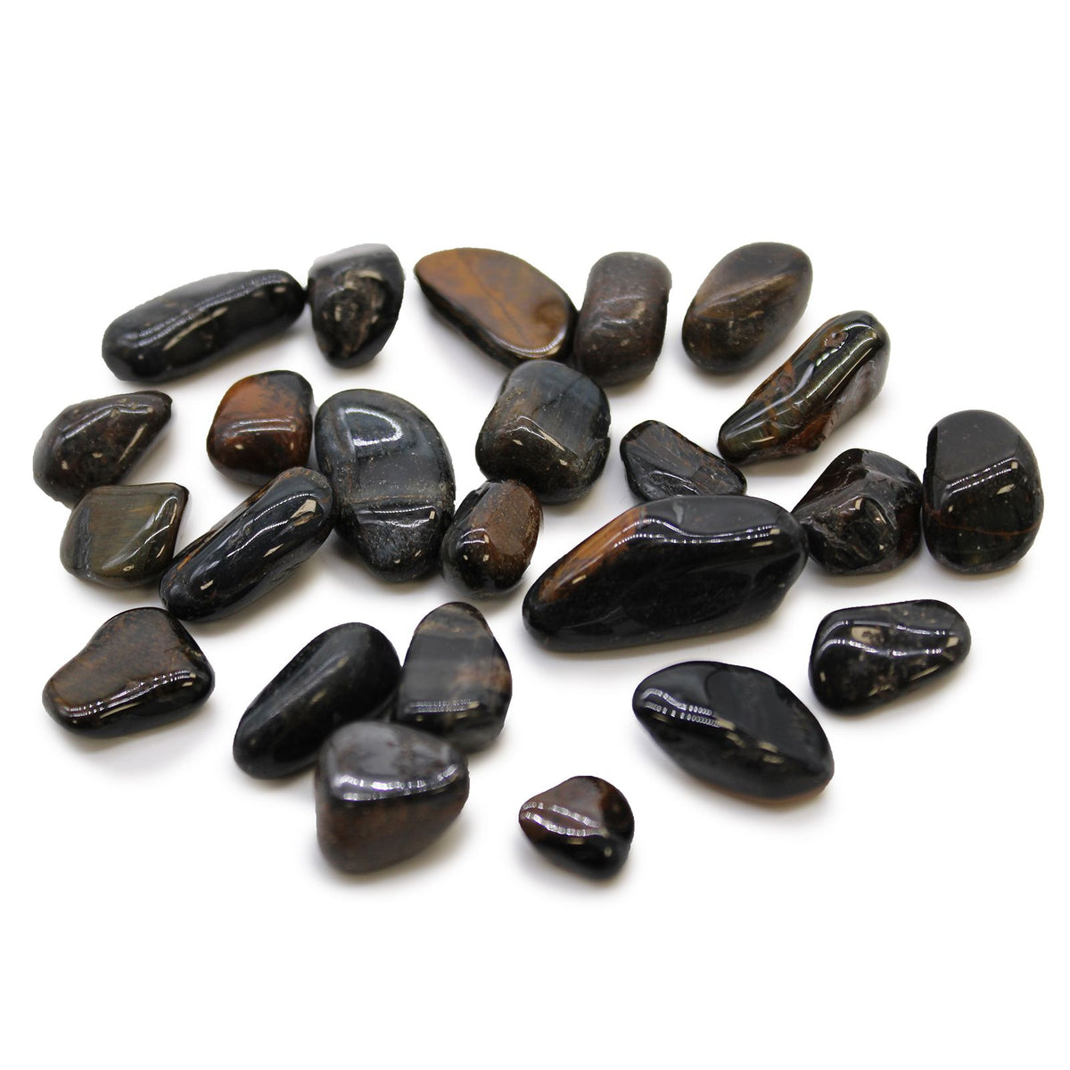 Small African Tumble Stones, Tigers Eye, Blue stones arranged on a white background, viewed from above