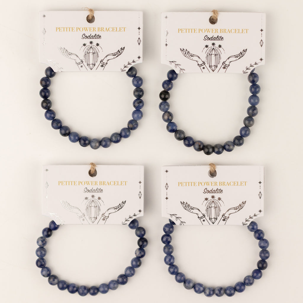 Four sodalite bracelets shown on illustrated cards