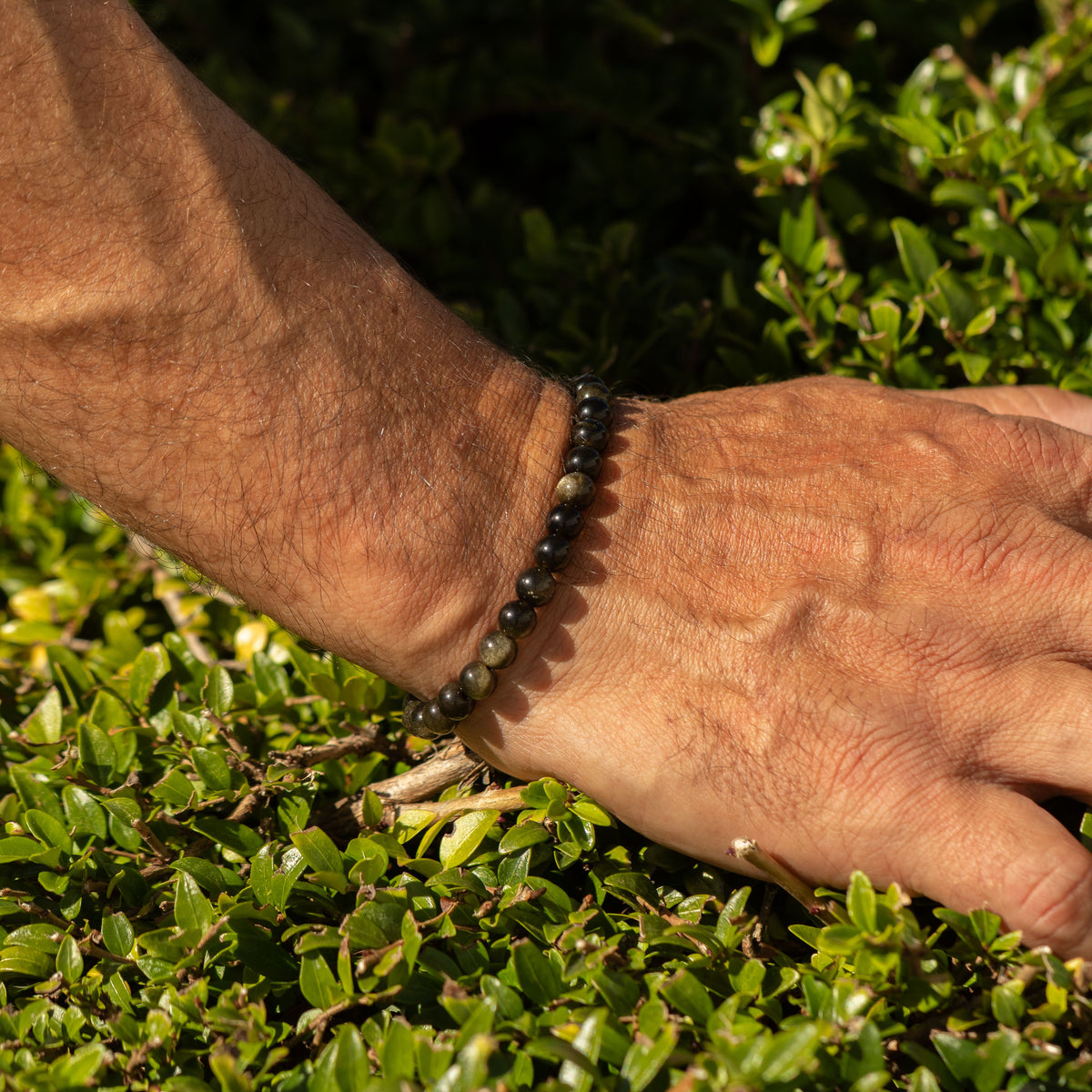 Gold Obsidian bracelet worn outdoors in sunlight