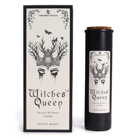 Ancient Witch Witches' Queen candle beside its box, crown and antler design, white background