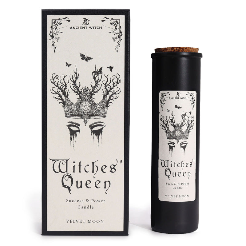 Ancient Witch Witches' Queen candle beside its box, crown and antler design, white background