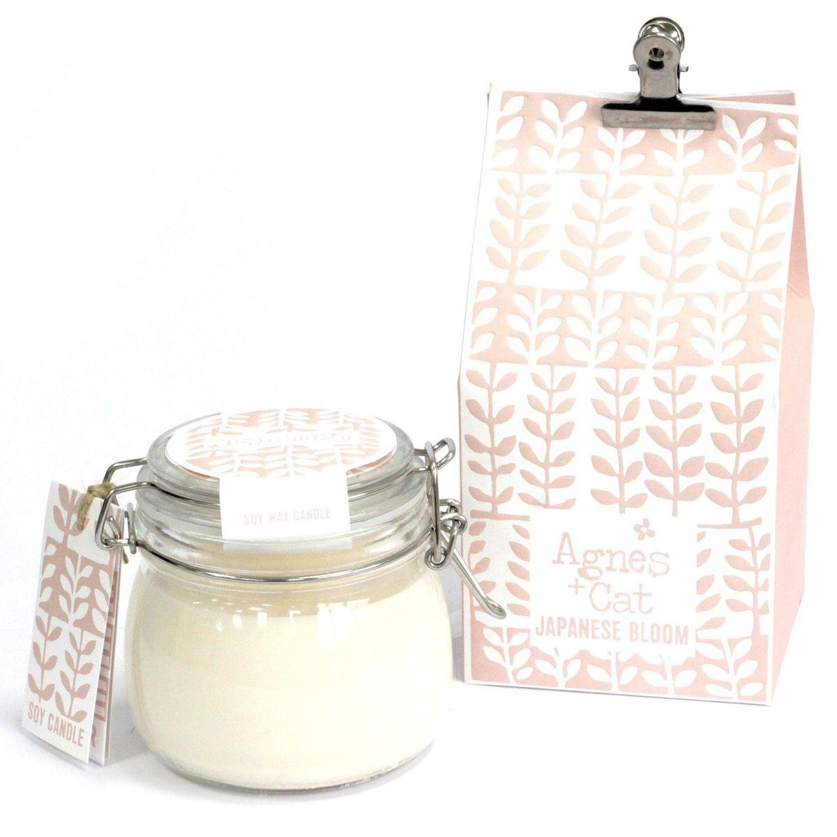 Agnes + Cat Kilner Jar Candle, Japanese Bloom, clear glass jar with pale wax beside its patterned packaging