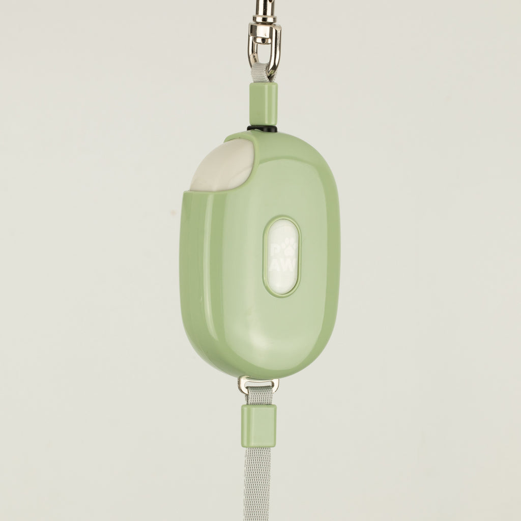 Close view of green Pocket Pod casing and button