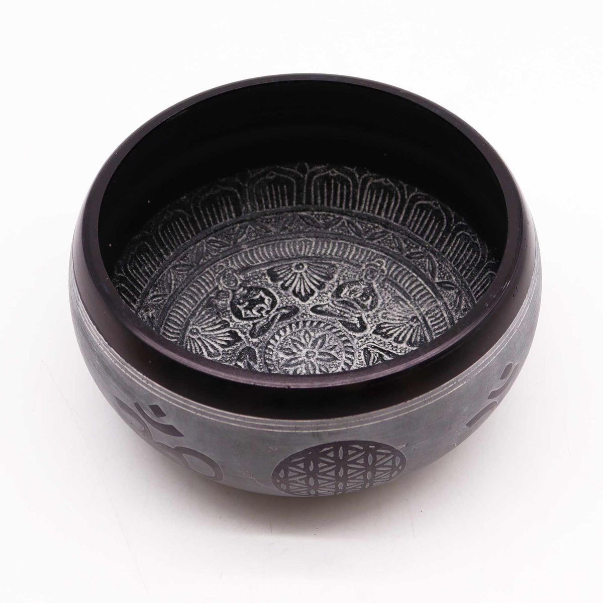 Earth Powder Singing Bowl, Om Five Buddha, 16cm, dark bowl shown open at an angle with engraved interior