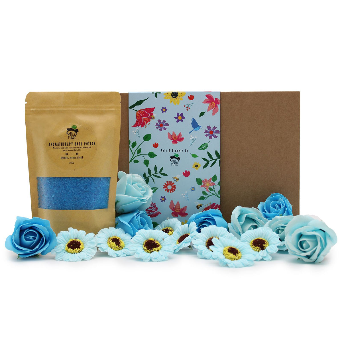 Blue salt pouch and flowers displayed in front of a brown box with a floral band