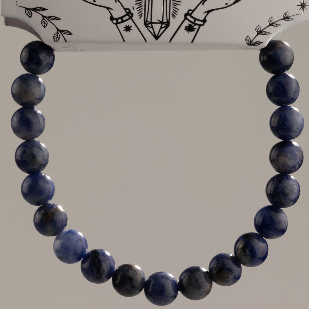 Close view of the blue and grey bracelet beads