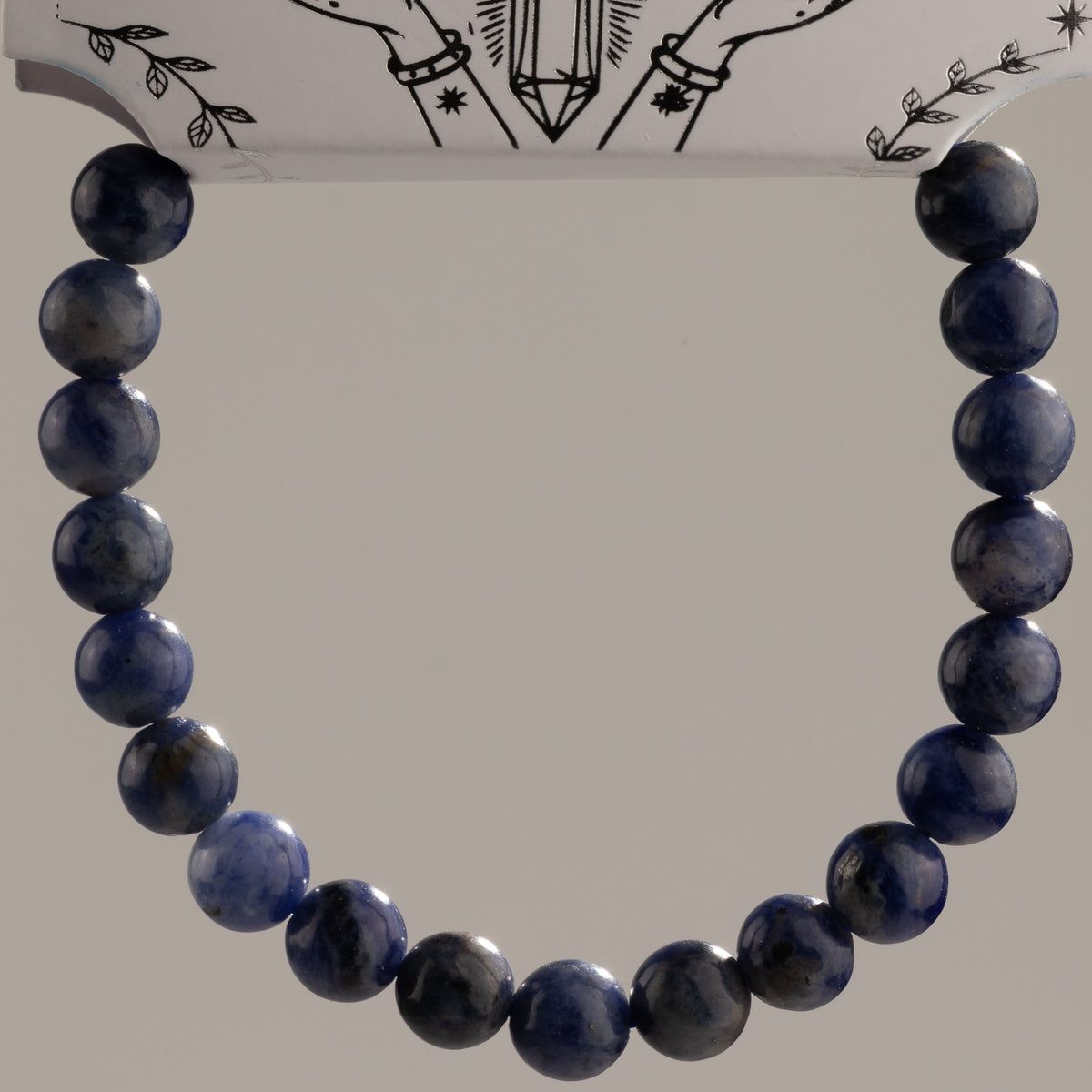 Close view of the blue and grey bracelet beads