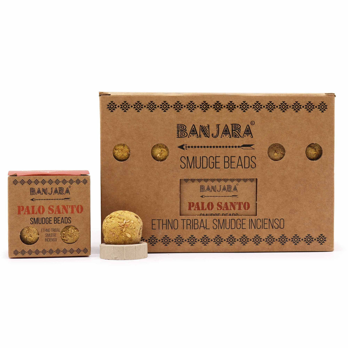 Banjara Smudge Beads, Palo Santo in a brown box beside a loose golden bead on a white background