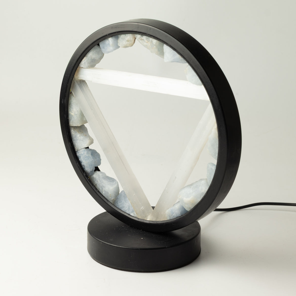 Angled view showing the lamp's circular frame and base