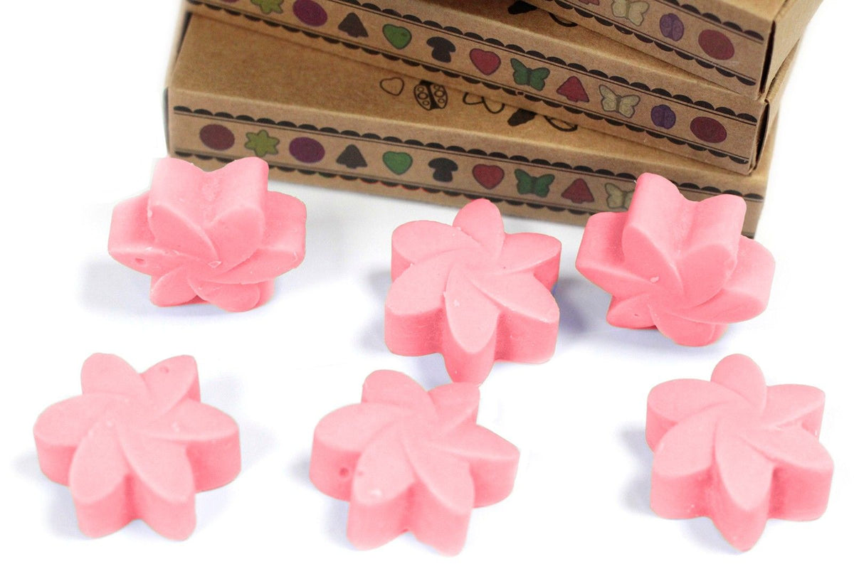 Box of 6 Wax Melts, Classic Rose, six pink flower-shaped melts beside a patterned brown box