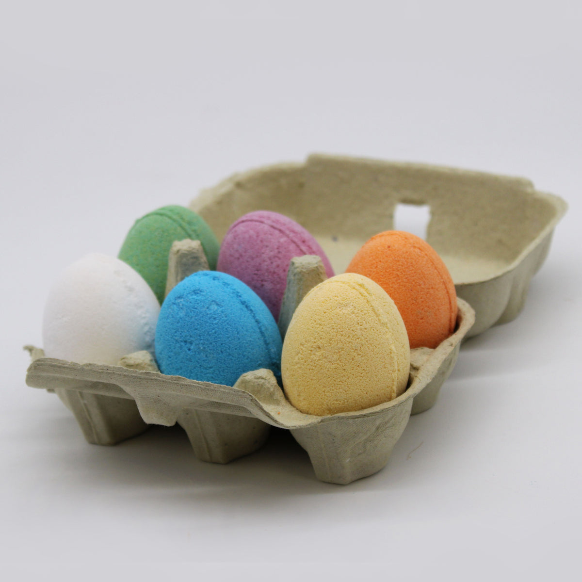 6 Bath Eggs in a Tray, Cherry, assorted coloured eggs in an open cardboard tray, front view
