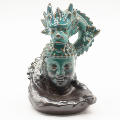 Front view of the glossy teal dragon and dark grey Buddha incense burner against white