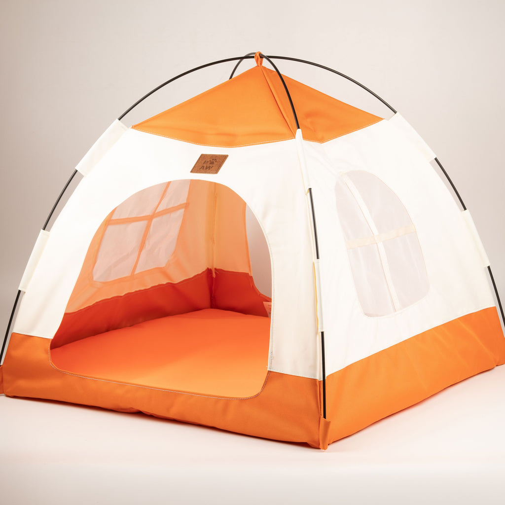 Angled view of the assembled beige and orange tent bed