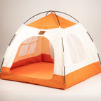 Angled view of the assembled beige and orange tent bed