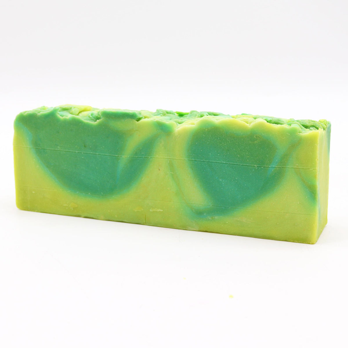 Aloe Vera soap loaf shown whole from the front, with green and yellow swirls on white