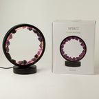 Amethyst halo lamp beside its product box
